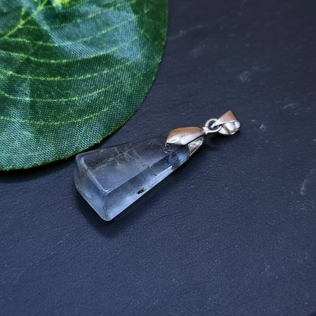 SilverStones.Pk multi-colored fluorite stone pendant with a nickel-free metal hook, promoting clarity and focus.