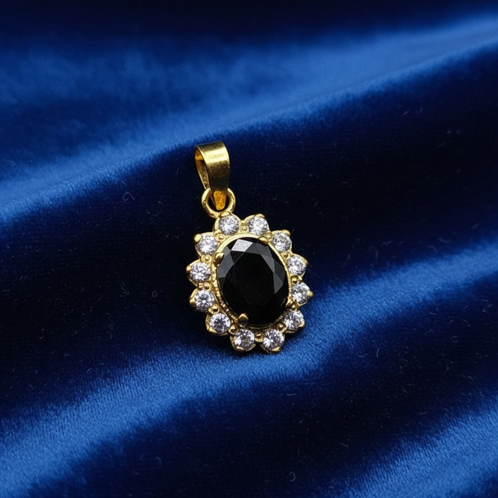 SilverStones.Pk oval black zircon pendant with 24K gold plating and surrounding white zircon stones.