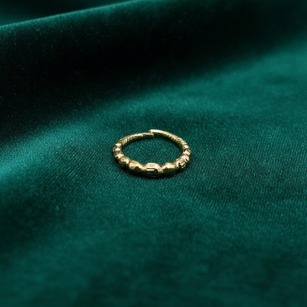 SilverStones.Pk 10mm 24 carat gold-plated sterling silver nose ring with textured beaded design.