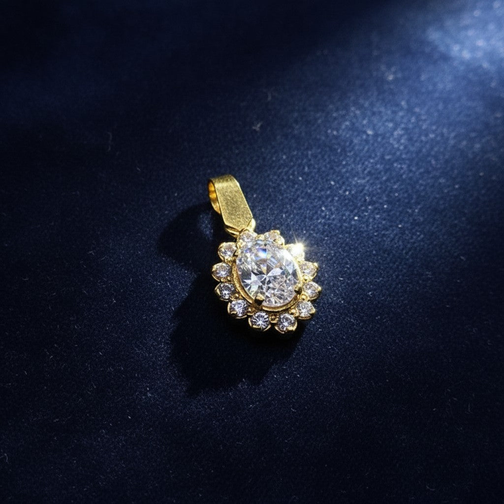 SilverStones.Pk 925 sterling silver pendant with 24K gold plating and oval-cut zircon stones, surrounded by smaller clear stones.