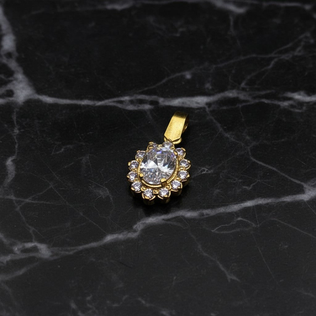 SilverStones.Pk 925 sterling silver pendant with 24K gold plating and oval-cut zircon stones, surrounded by smaller clear stones.