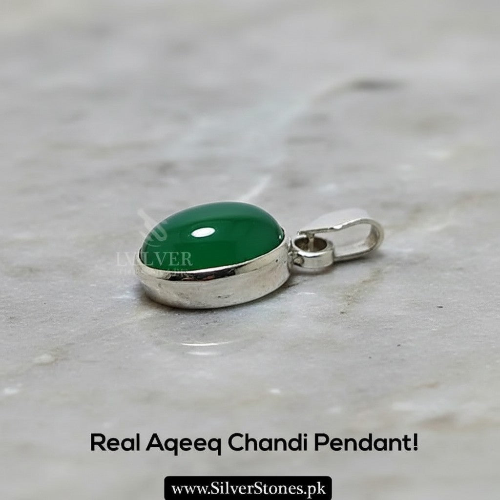 SilverStones.Pk oval green aqeeq stone pendant with silver setting. Symbolizes strength and protection.