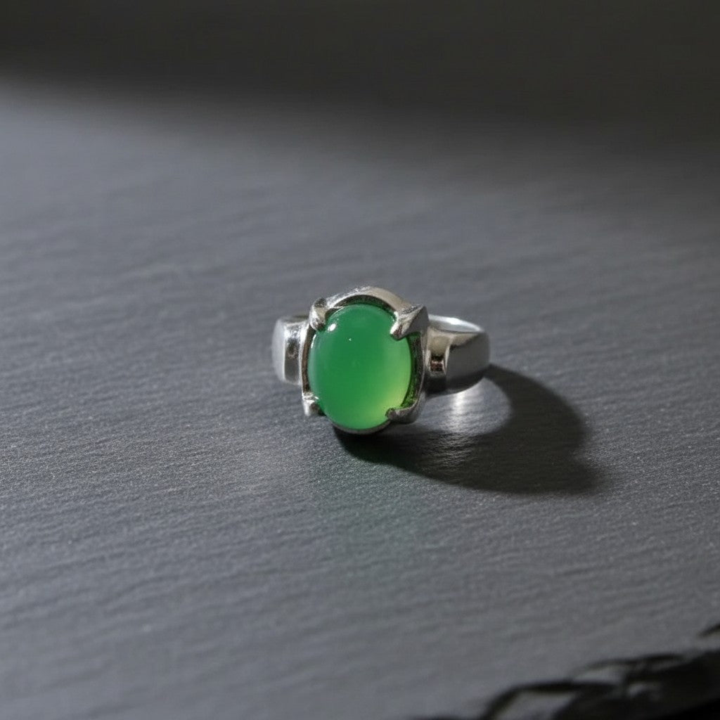 SilverStones.Pk men's sterling silver ring with a smooth, oval, light green Aqeeq stone.