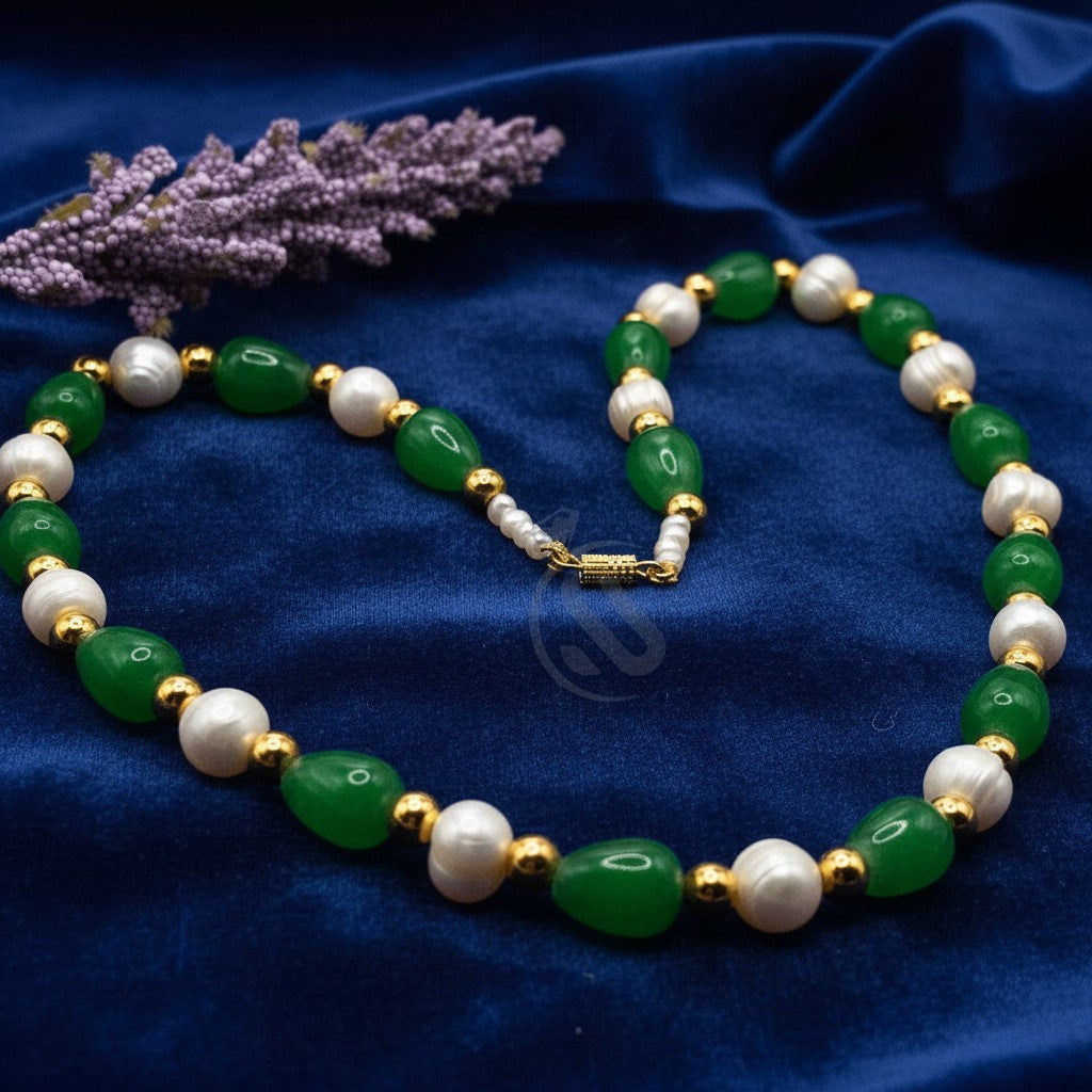 SilverStones.Pk necklace with green jade beads, white pearls, and gold accents. Features a magnetic clasp.