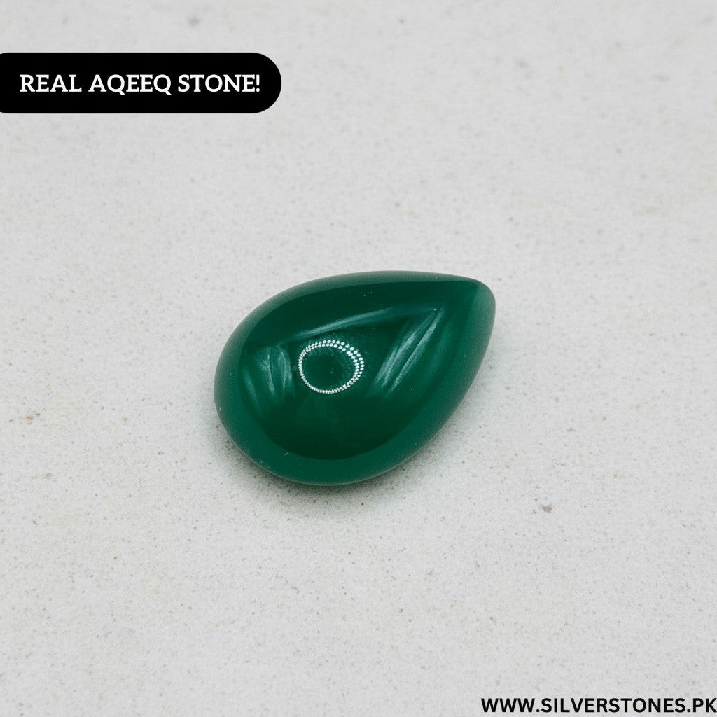 SilverStones.Pk real Yamni Aqeeq stone, a polished green gemstone with natural banding, ideal for jewelry.