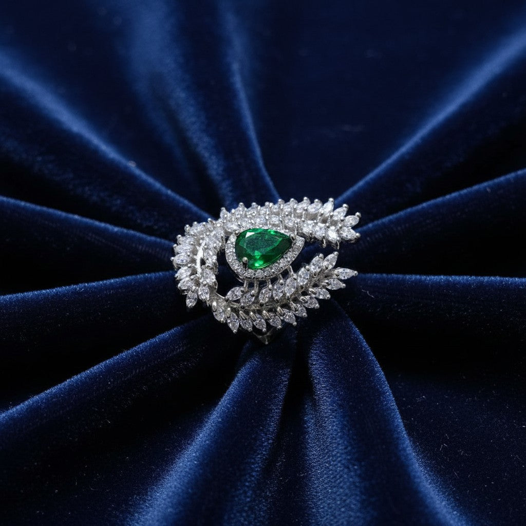 SilverStones.Pk designer ladies ring with pear-cut green zircon center and white zircon leaf accents.