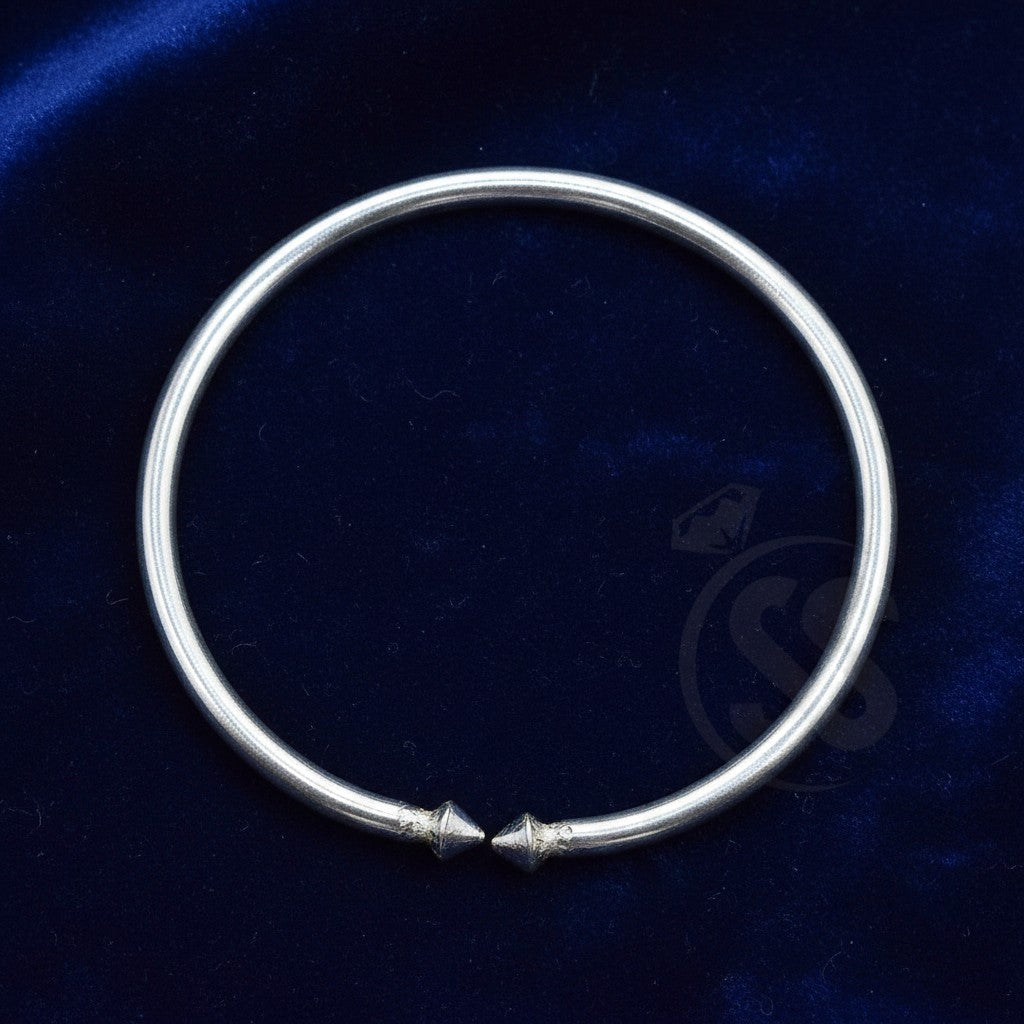 SilverStones.Pk handmade pure silver wrist band for kids, 1.5 inches, adjustable, with a simple elegant design.
