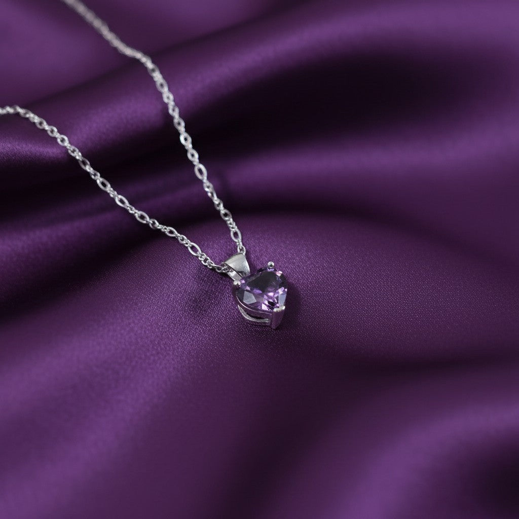 SilverStones.Pk heart-shaped amethyst pendant necklace with a delicate figaro chain, symbolizing love and tranquility.