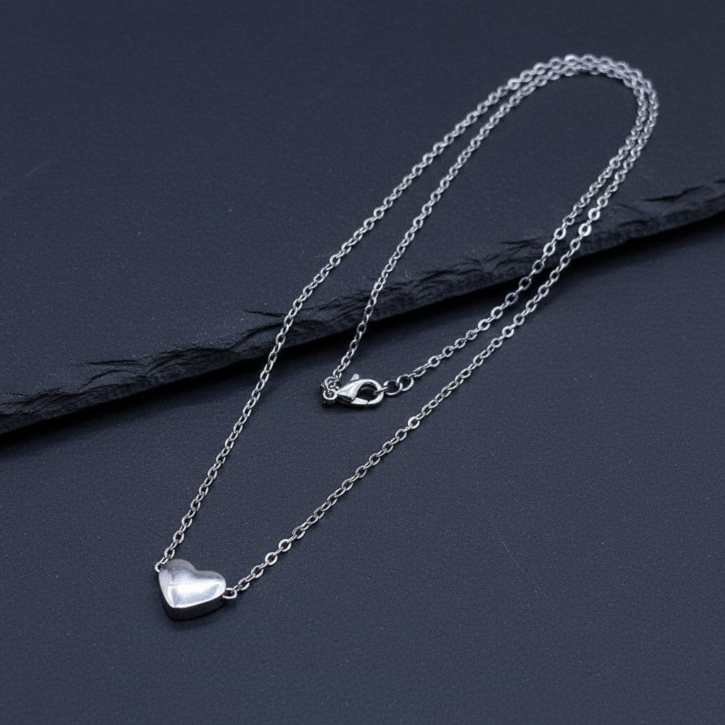 SilverStones.Pk women's silver-tone imitation heart pendant necklace with a delicate chain. Classic and elegant.