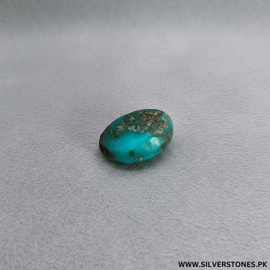 SilverStones.Pk oval-shaped Shajri Hussaini Feroza turquoise gemstone with natural veining and antique appeal.