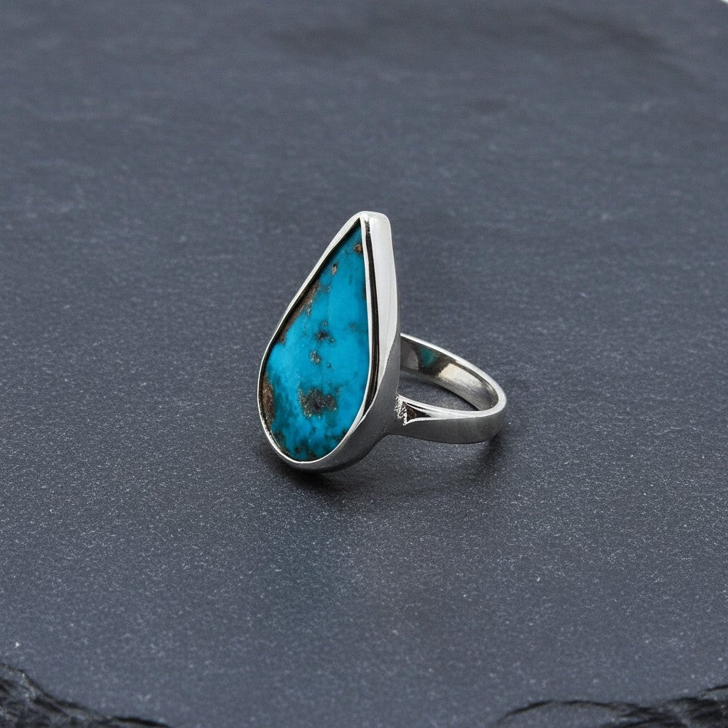 SilverStones.Pk ladies ring with a teardrop-shaped real Irani Feroza gemstone set in silver.