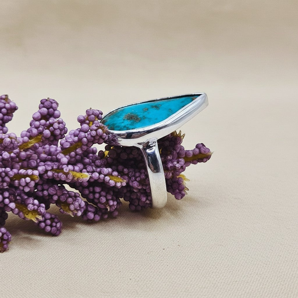 SilverStones.Pk ladies ring with a pear-shaped real Irani Feroza gemstone set in gold-plated silver.