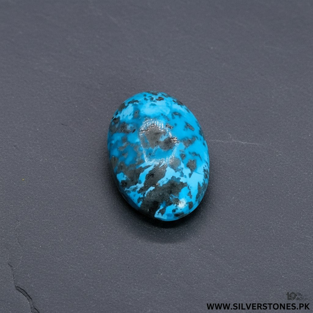 SilverStones.Pk oval-shaped Shajri Irani Feroza turquoise gemstone with black veining, 35 carats.
