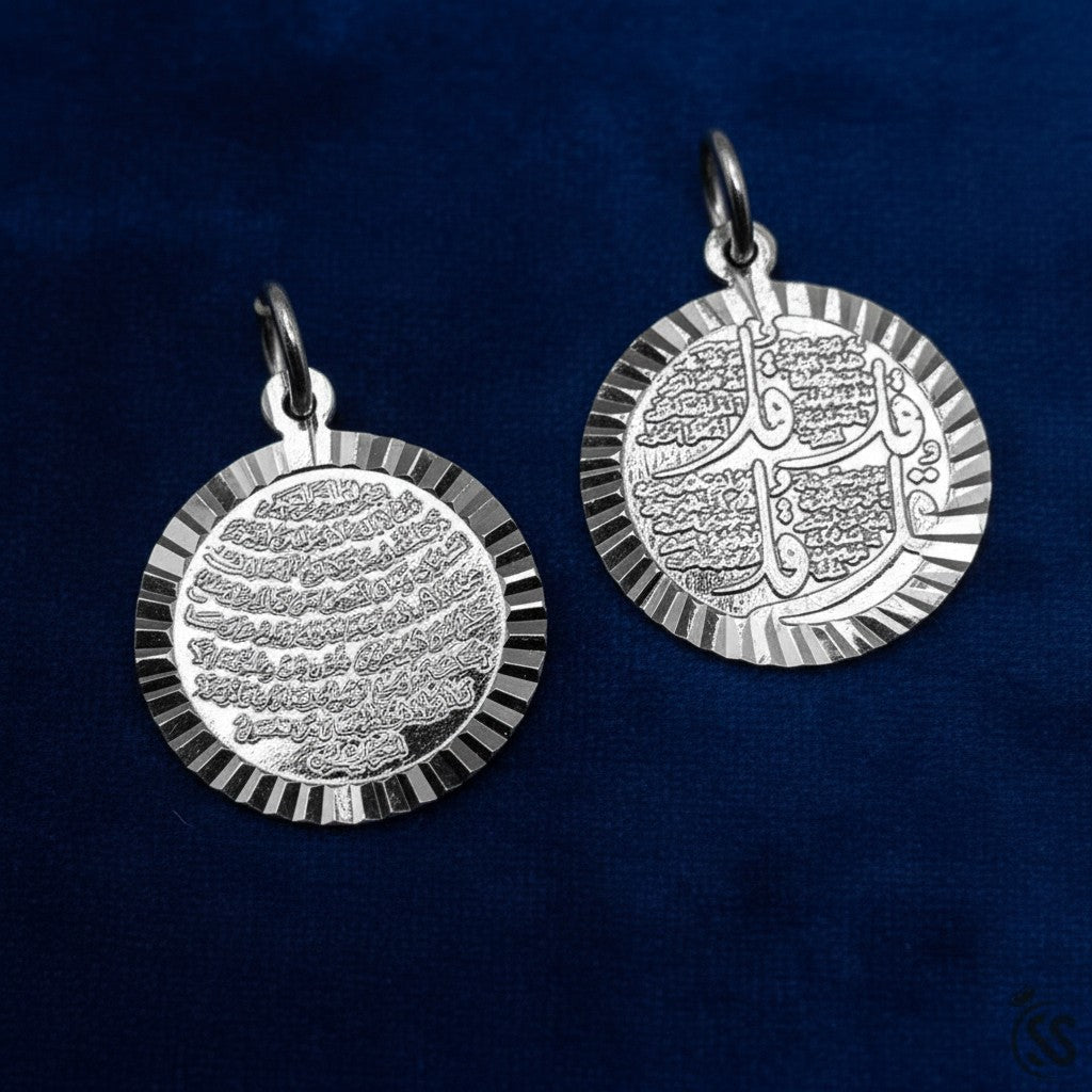SilverStones.Pk Islamic pendant with Arabic calligraphy of 4 Quls and Ayat Ul Kursi on both sides. Round design with textured edge.