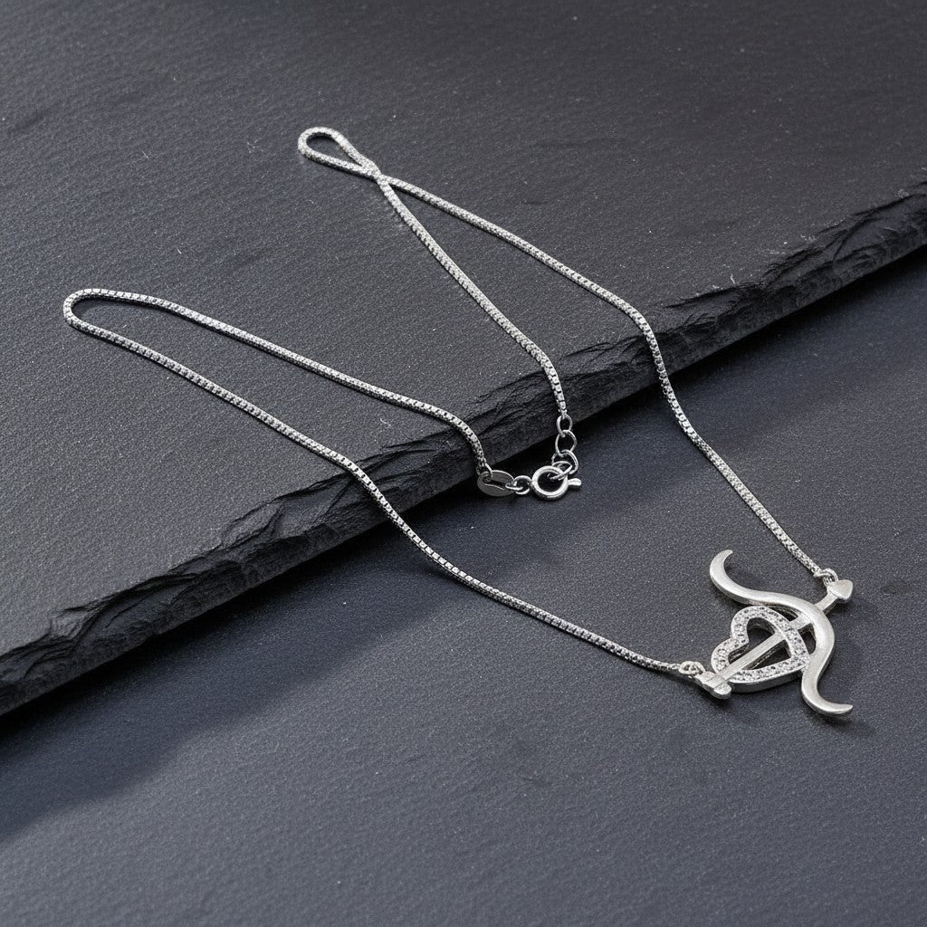 SilverStones.Pk Italian 925 sterling silver necklace with a vintage-inspired pendant featuring a heart shape and bow, adorned with zircon stones.