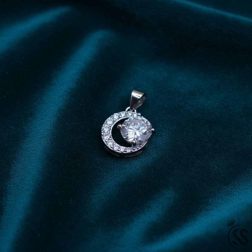 SilverStones.Pk Italian 925 sterling silver pendant with a large central zircon stone and a crescent of smaller stones.