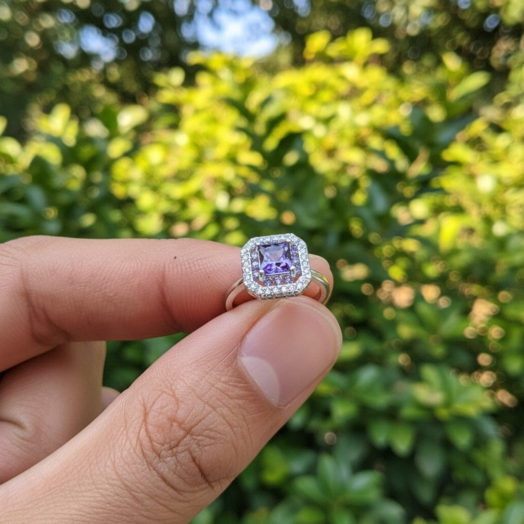 SilverStones.Pk Italian 925 sterling silver ring with a central square purple zircon surrounded by smaller clear zircons.