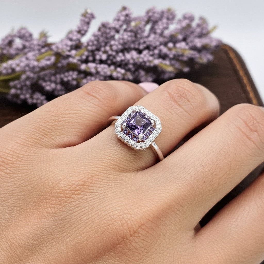SilverStones.Pk Italian 925 sterling silver ring with a central square purple zircon surrounded by smaller white zircon stones.