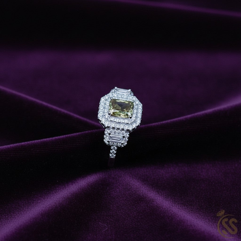 SilverStones.Pk Italian 925 sterling silver ring with a central green-brown square-cut stone surrounded by small clear stones.