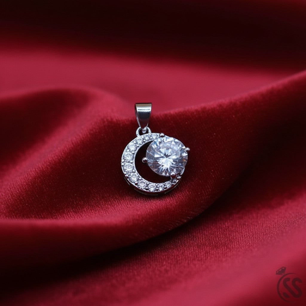 SilverStones.Pk Italian 925 sterling silver pendant with a large central zircon stone and a crescent of smaller stones.