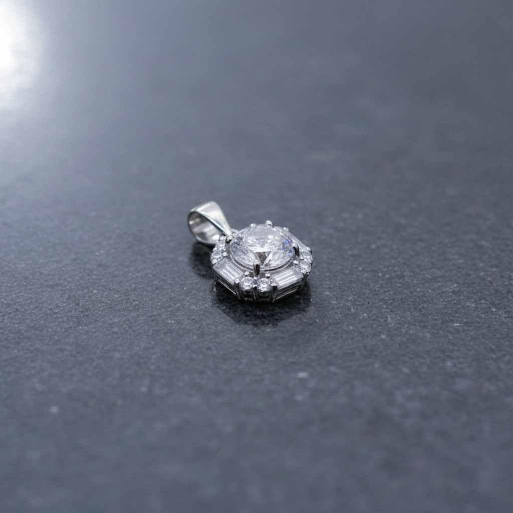 SilverStones.Pk Italian 925 sterling silver pendant with a central round zircon and baguette accents, rhodium plated.