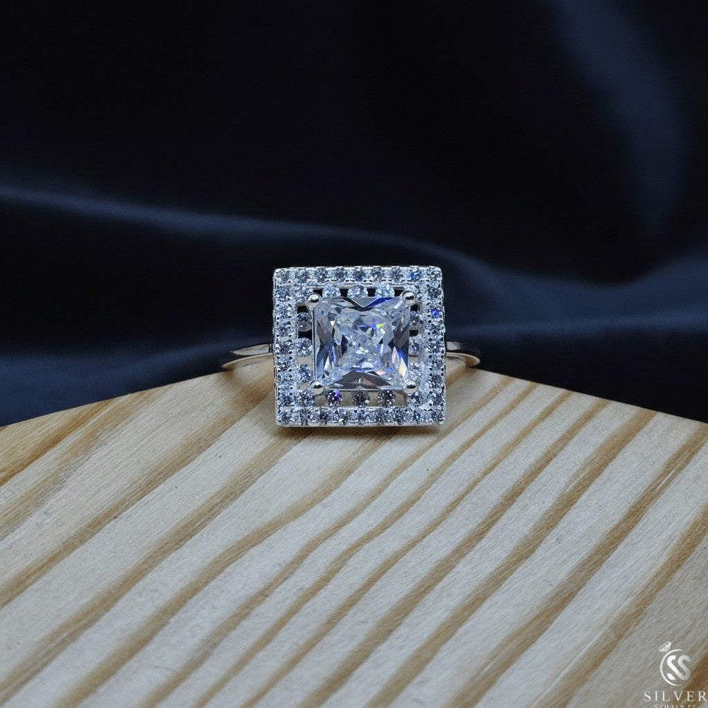 SilverStones.Pk Italian 925 sterling silver ring with a large square-cut zircon center stone surrounded by smaller zircon stones.