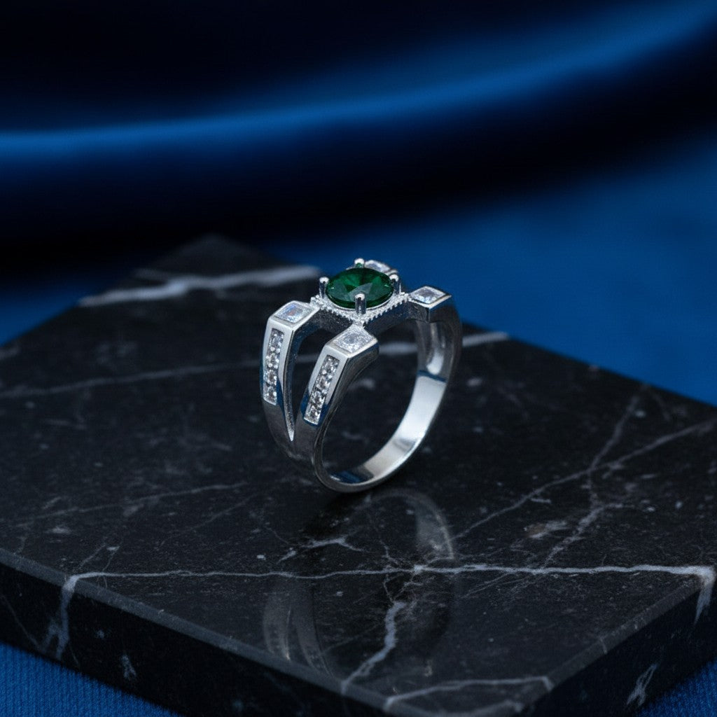 SilverStones.Pk Italian 925 sterling silver men's ring with a central green stone and clear accent stones. Polished finish.