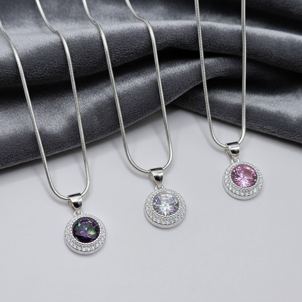 SilverStones.Pk Italian 925 sterling silver snake chain necklace with a round pendant featuring a large central cubic zirconia surrounded by smaller white zircons.