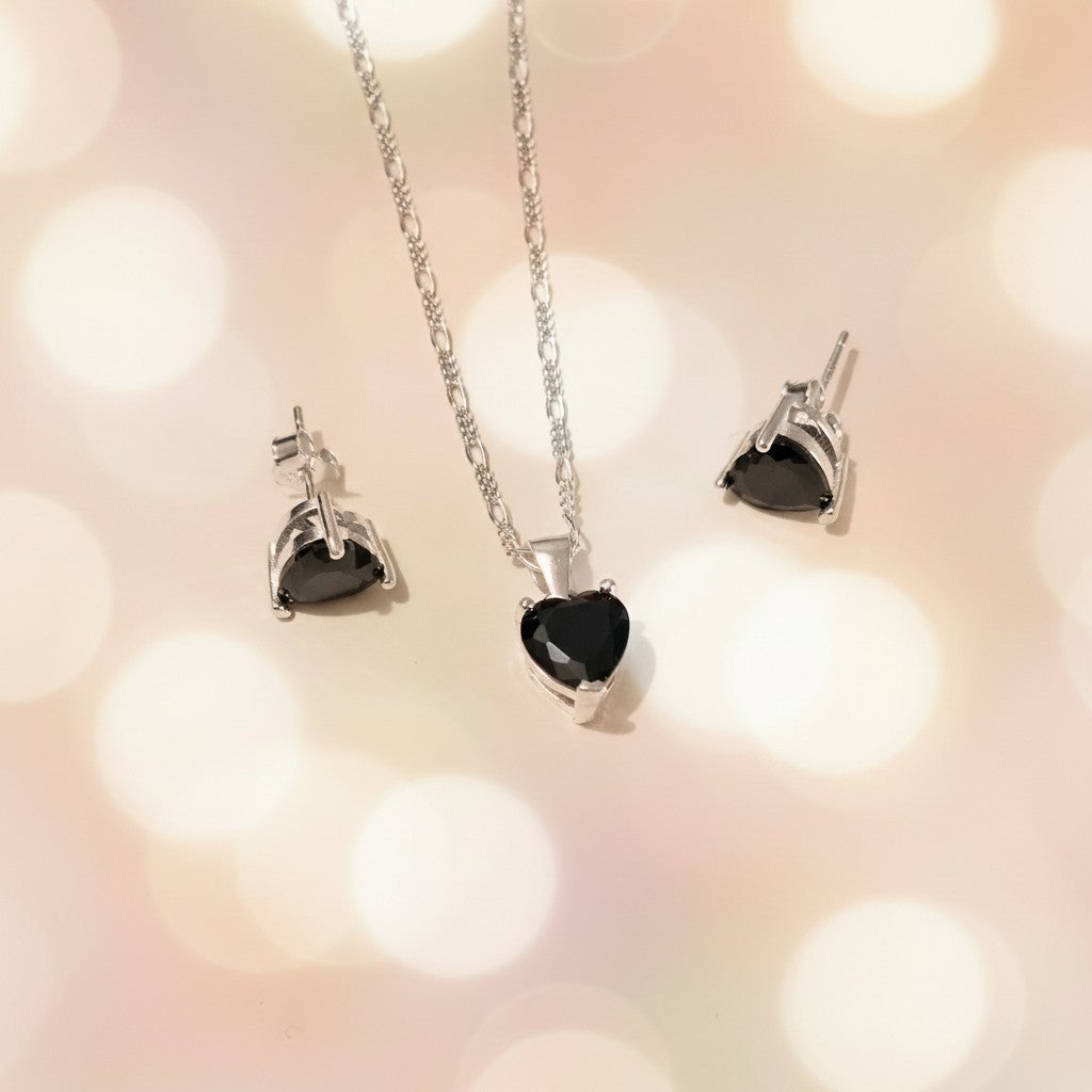 SilverStones.Pk Italian 925 sterling silver pendant and earrings set with black heart-shaped zircon stones.