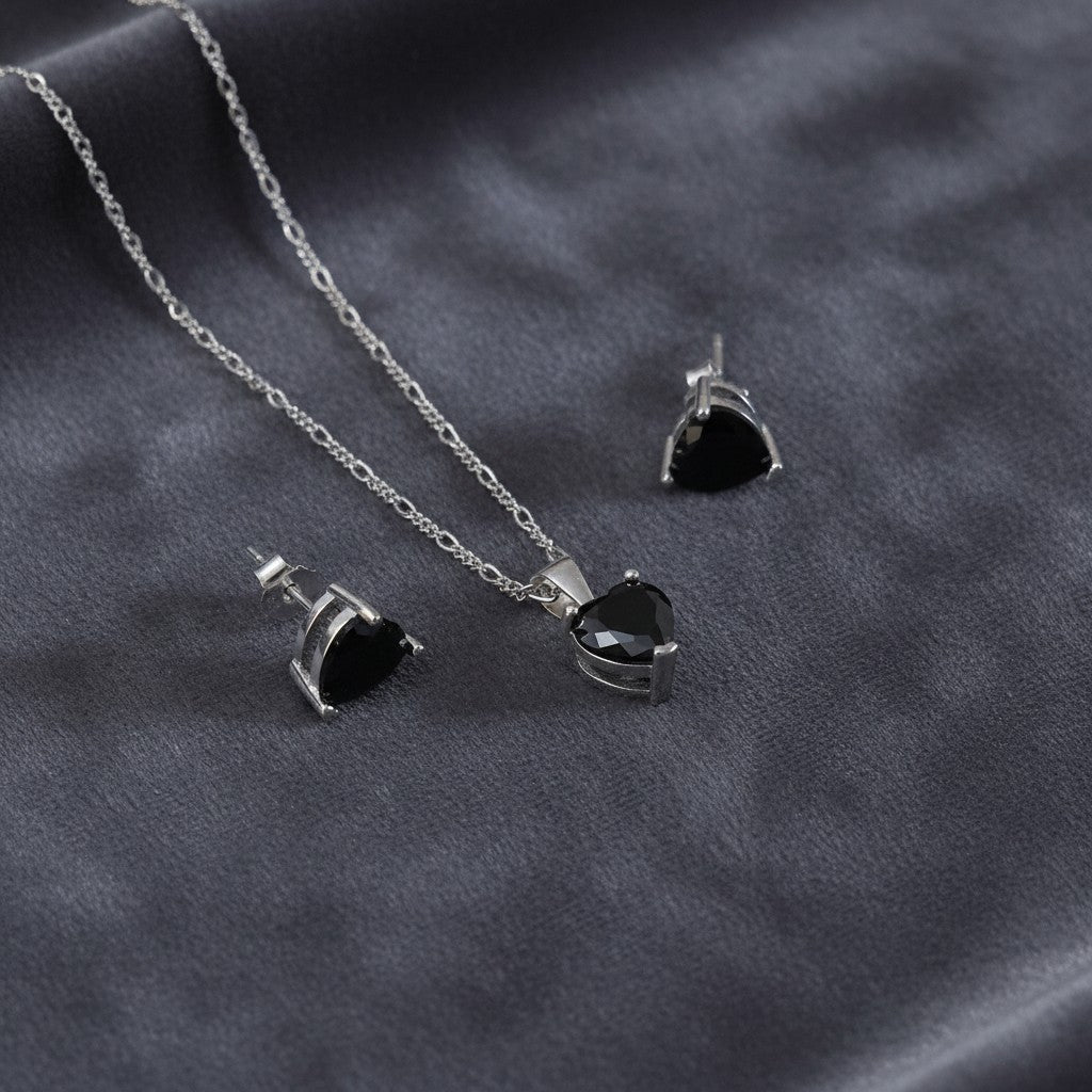 SilverStones.Pk Italian 925 sterling silver pendant and earrings set with black heart-shaped zircon stones.