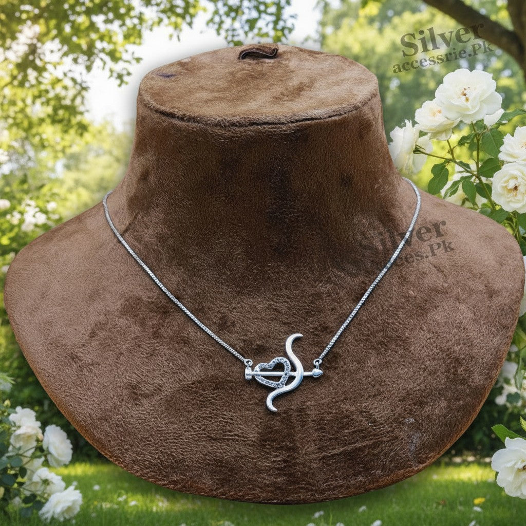 SilverStones.Pk Italian 925 sterling silver necklace with a vintage-inspired pendant featuring a heart pierced by an arrow, adorned with zircon stones.