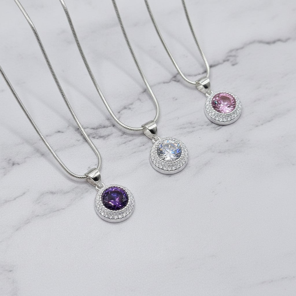 SilverStones.Pk Italian 925 sterling silver snake chain necklace with a round pendant featuring a large white zircon surrounded by smaller white zircons.