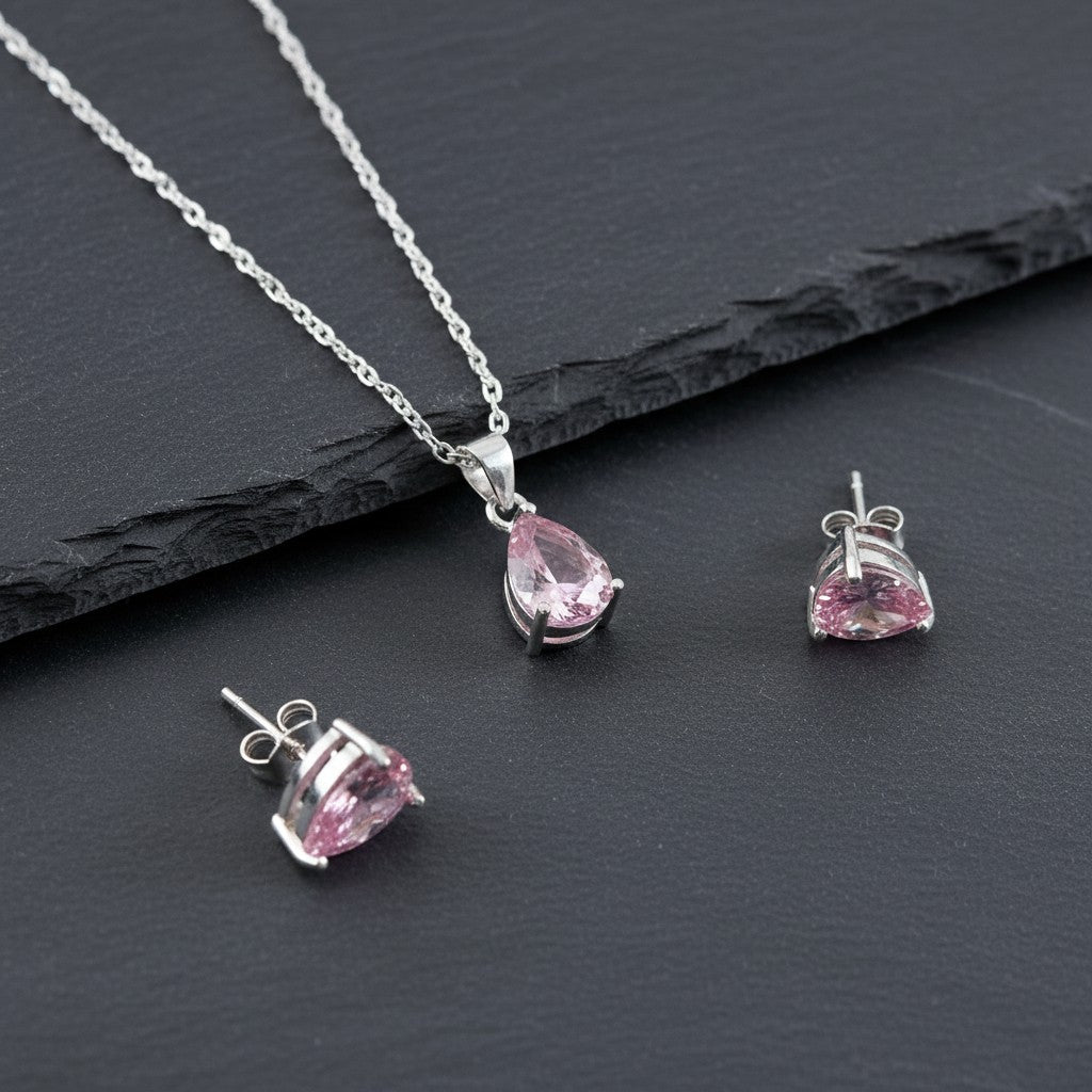 SilverStones.Pk Italian 925 sterling silver pendant and earrings set with pink pear-cut zircon stones.
