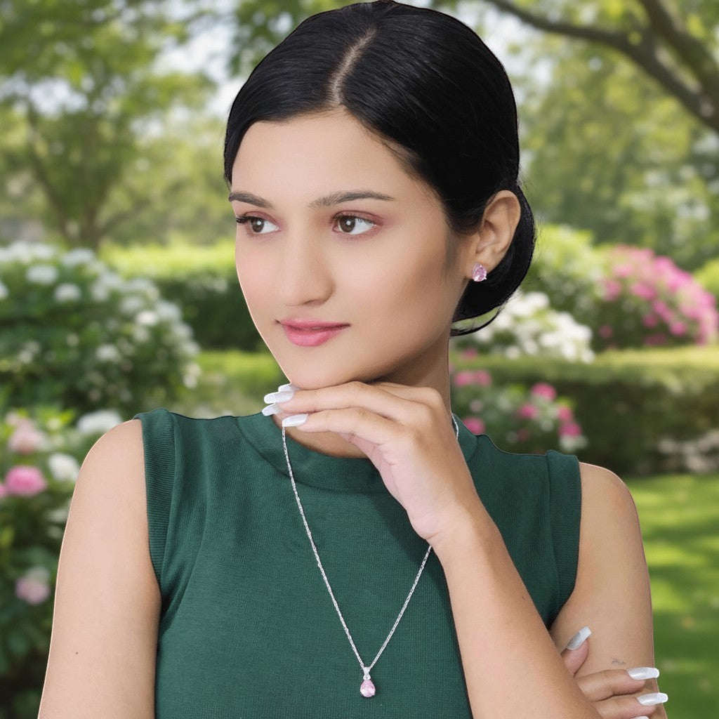 SilverStones.Pk Italian 925 sterling silver pendant with a pink teardrop stone, diamond-style setting, and matching earrings.