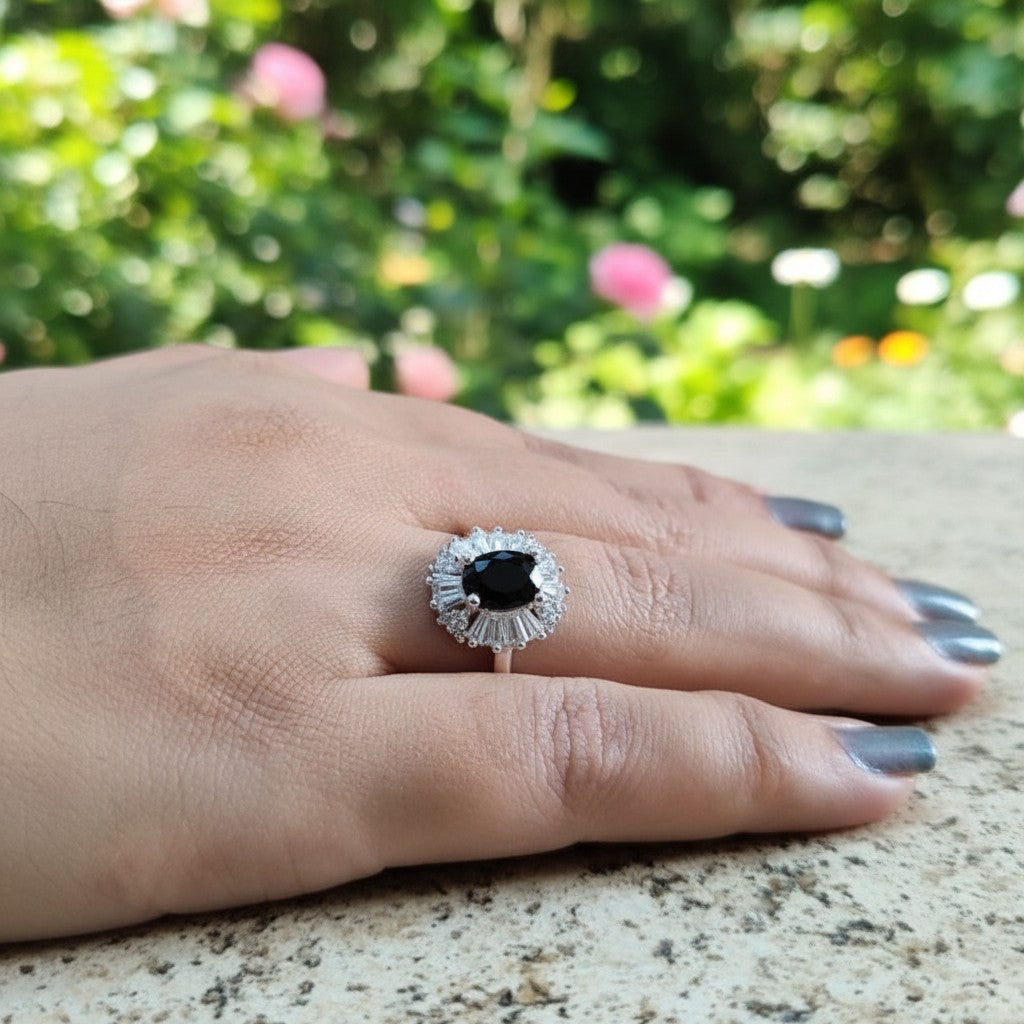 SilverStones.Pk Italian 925 sterling silver ring with oval black zircon center and baguette zircon halo.