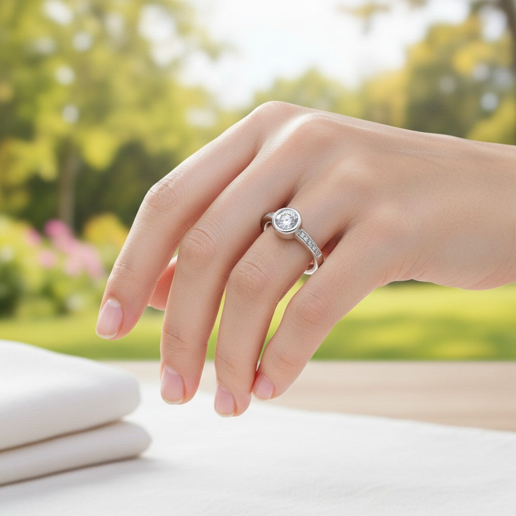 SilverStones.Pk Italian 925 sterling silver ring with a central round-cut zircon and smaller stones along the band.