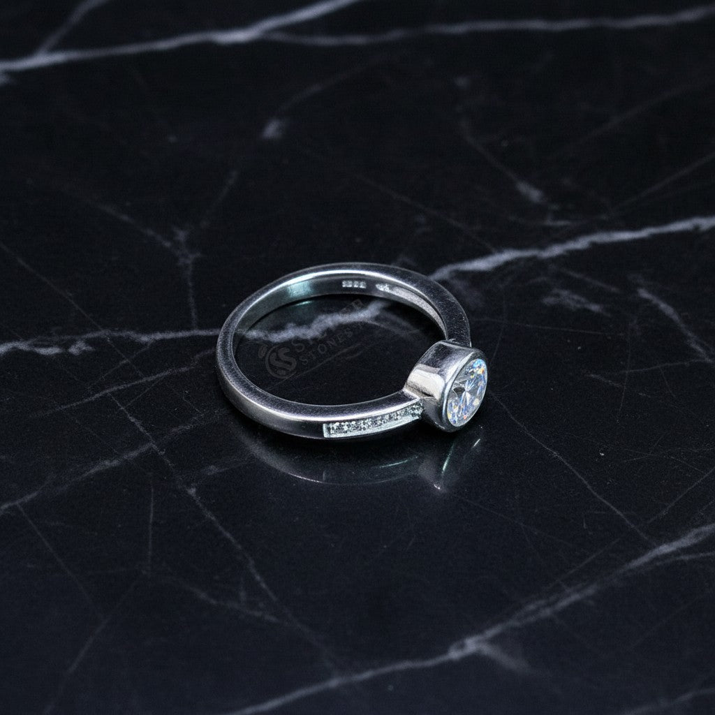 SilverStones.Pk Italian 925 sterling silver ring with a round-cut clear zircon stone and small accent stones.