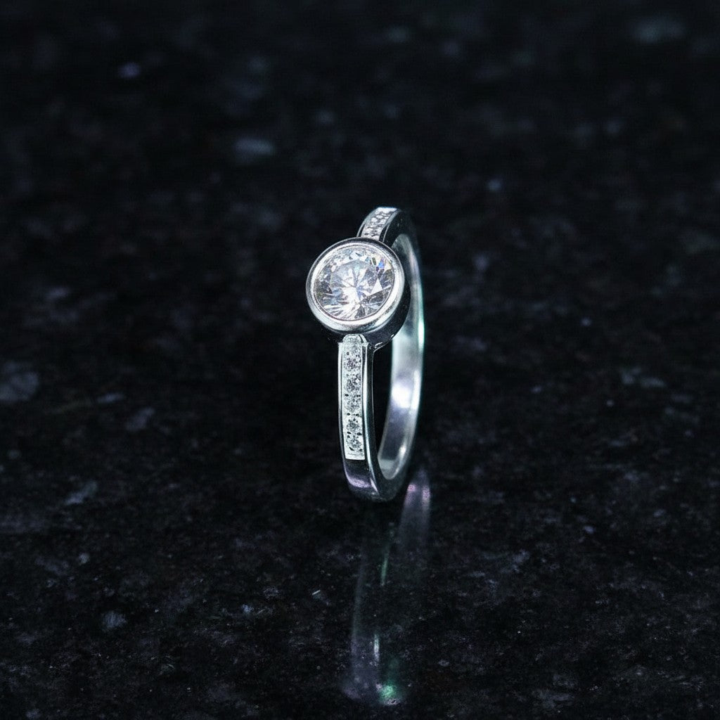 SilverStones.Pk Italian 925 sterling silver ring with a large central zircon and smaller stones on the band.