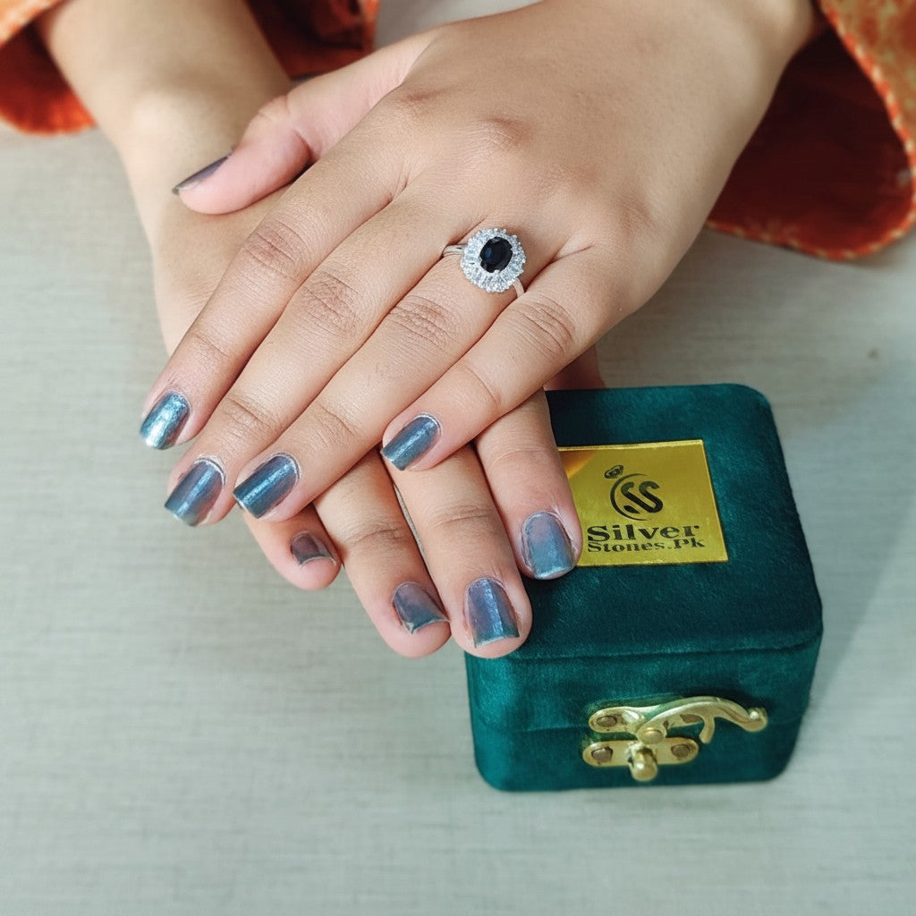 SilverStones.Pk oval dark blue zircon ring with halo of small clear stones, 925 Italian sterling silver.
