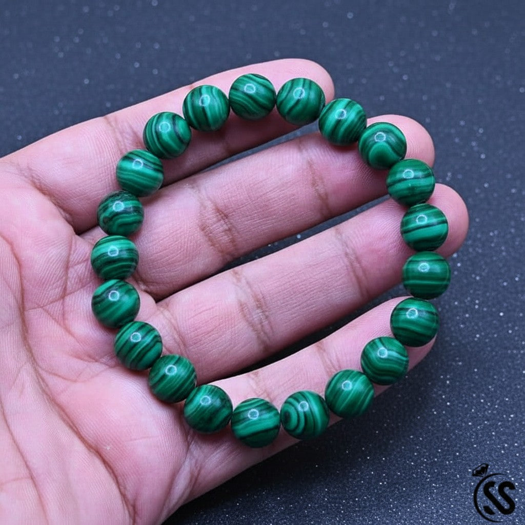 SilverStones.Pk Malachite real stone beaded bracelet with vibrant green swirls and black banding. Unisex design.