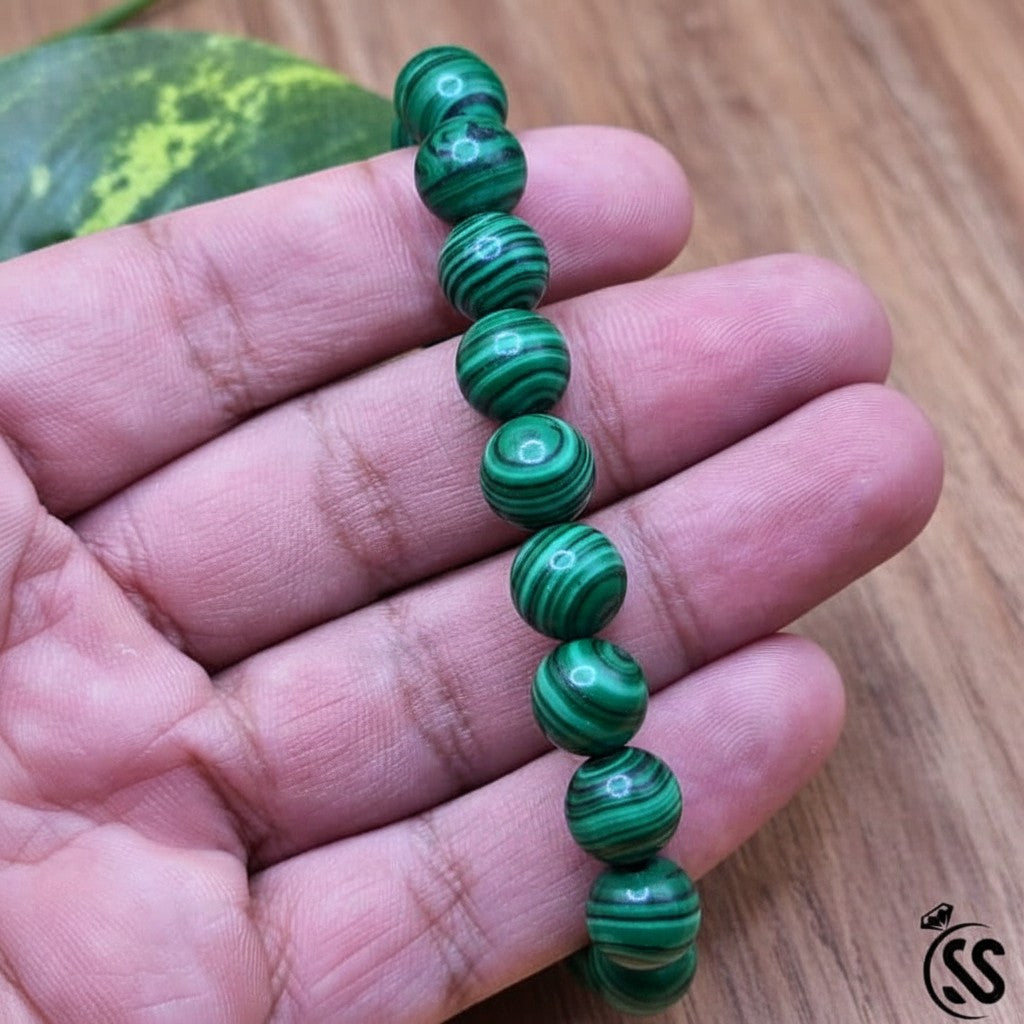 SilverStones.Pk Malachite real stone beaded bracelet with vibrant green swirls on a stretch cord.