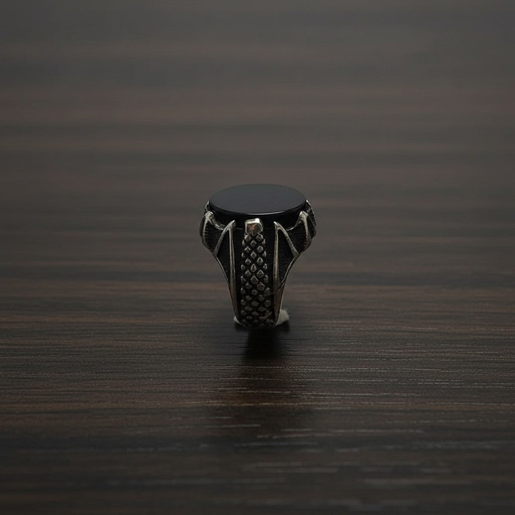 SilverStones.Pk men's ring with oval black Aqeeq stone and intricate silver band design.