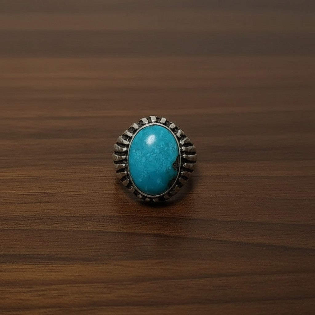 SilverStones.Pk men's ring with oval blue-green Irani Shajri Feroza gemstone set in a textured silver band.