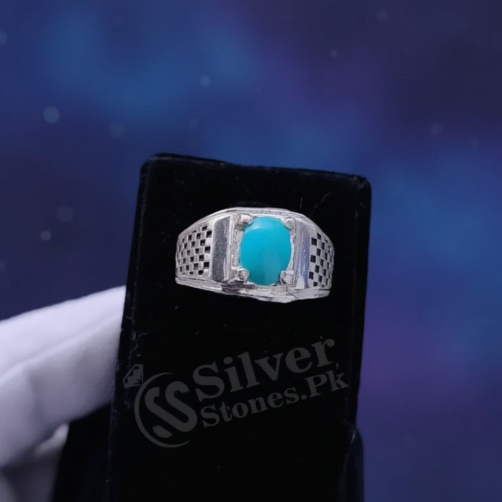 SilverStones.Pk men's ring with oval Irani Shajri Feroza gemstone in a silver setting with checkered sides.