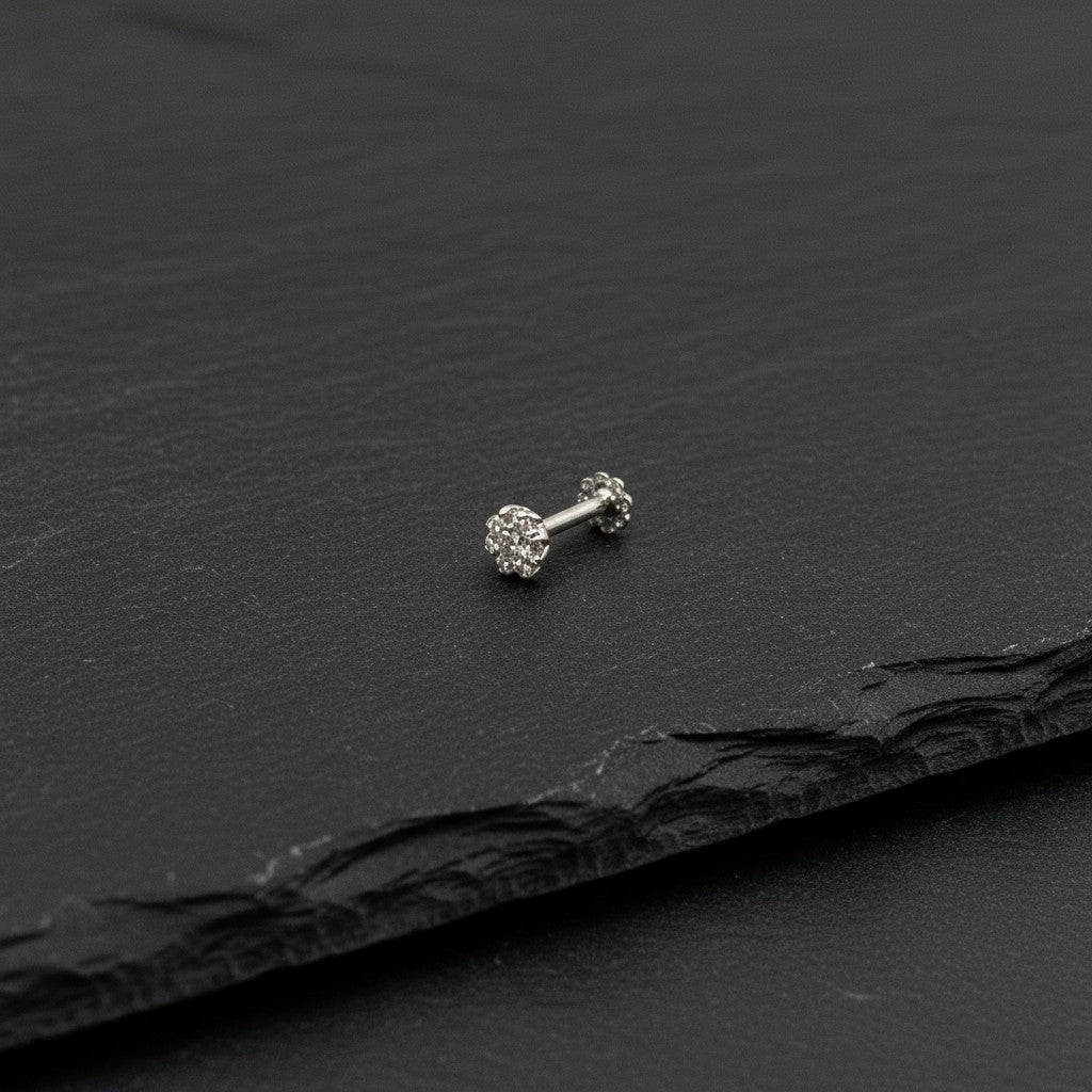 SilverStones.Pk 4mm moissanite diamond nose pin in sterling silver with a brilliant round cut stone.