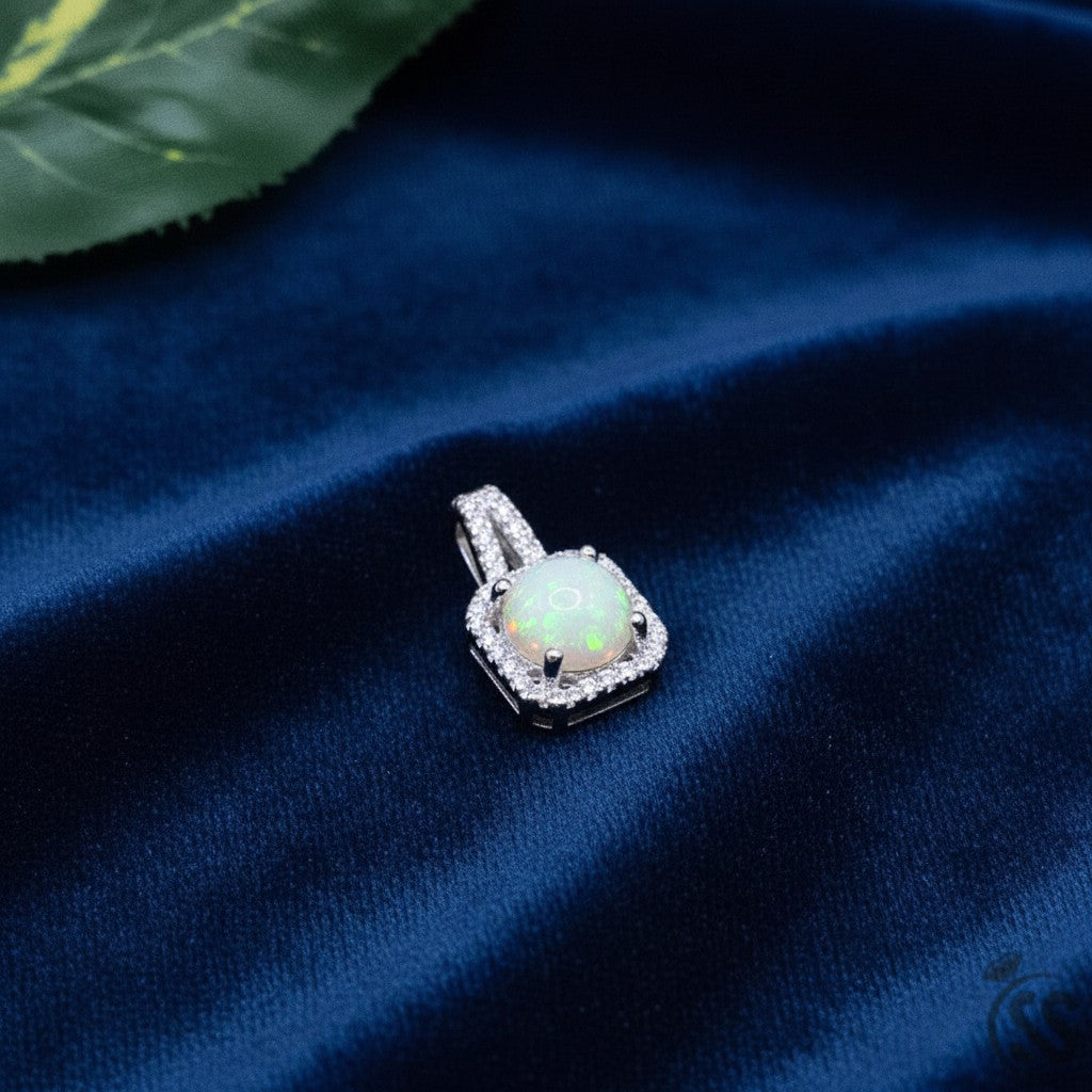 SilverStones.Pk real Ethiopian opal pendant with cubic zirconia halo, set in rhodium-plated sterling silver.
