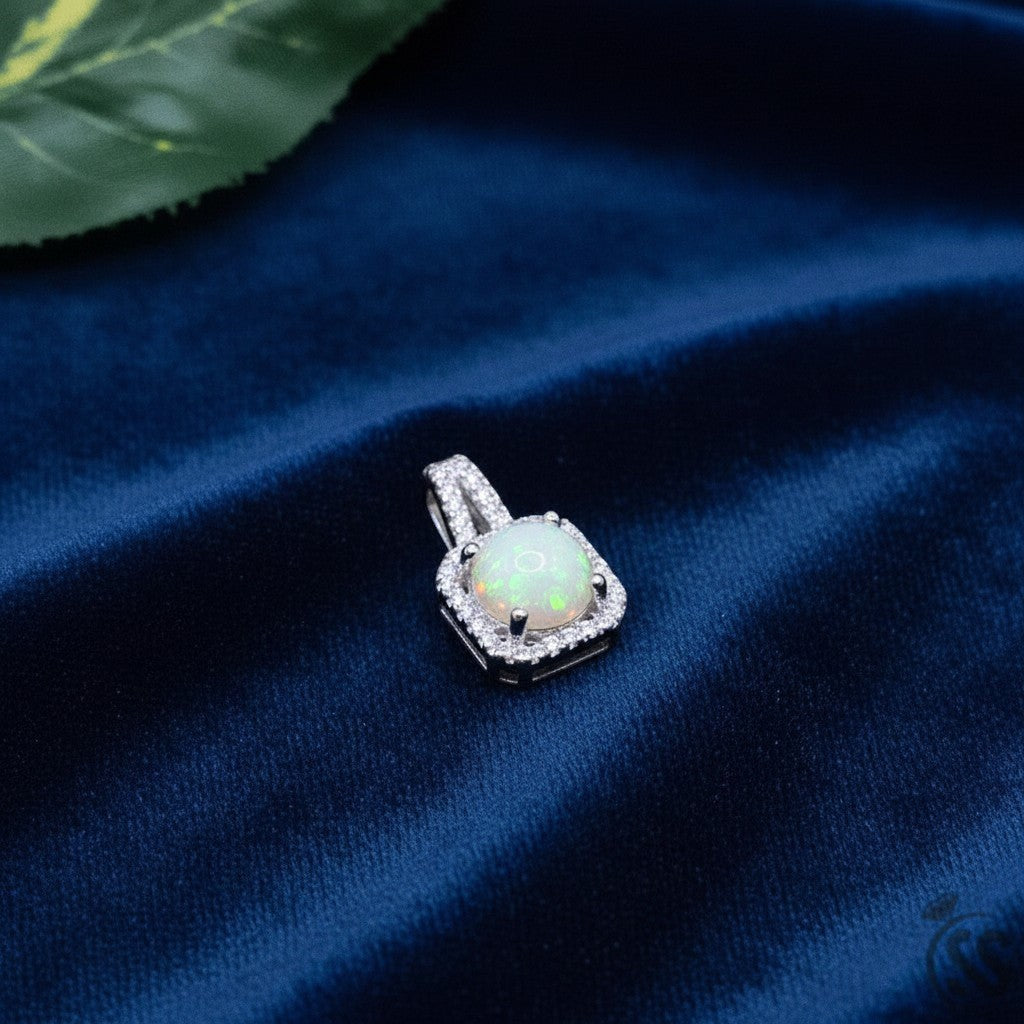 SilverStones.Pk real Ethiopian opal pendant with cubic zirconia halo, set in rhodium-plated sterling silver.