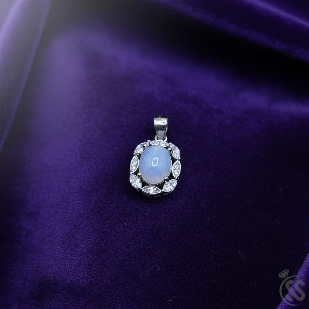 SilverStones.Pk real Ethiopian opal pendant with cubic zirconia accents, set in rhodium-plated sterling silver.