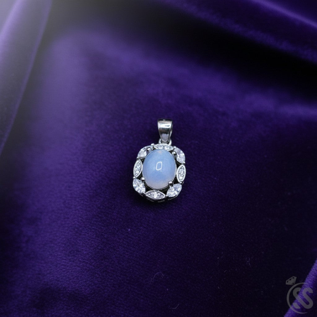 SilverStones.Pk real Ethiopian opal pendant with cubic zirconia accents, set in rhodium-plated sterling silver.
