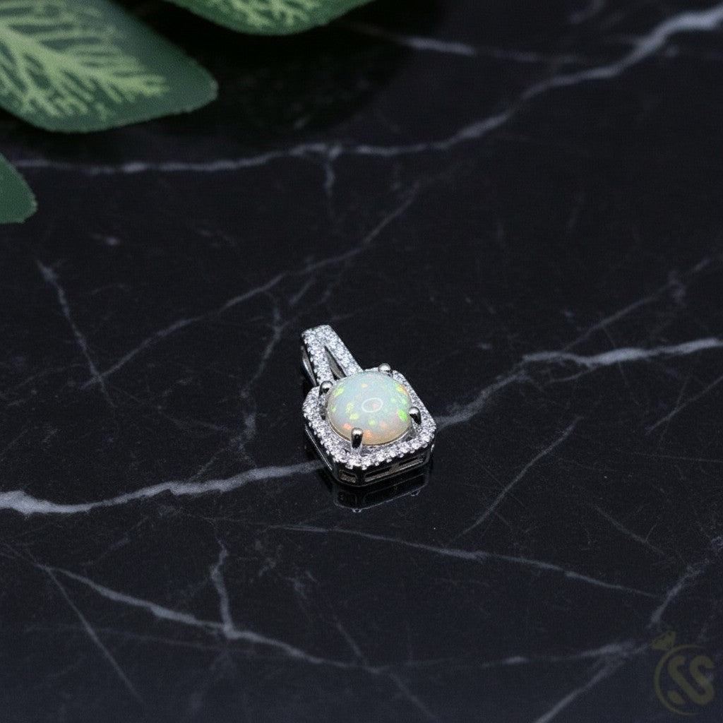 SilverStones.Pk real Ethiopian opal pendant with halo of cubic zirconia, set in rhodium-plated sterling silver.